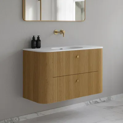 Noorwork 100 - Cabinetry in Natural Oak including Matt white Corian® sink top