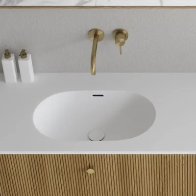 Noorwork 160D - Cabinetry in Natural Oak including Matt white Corian® sink top